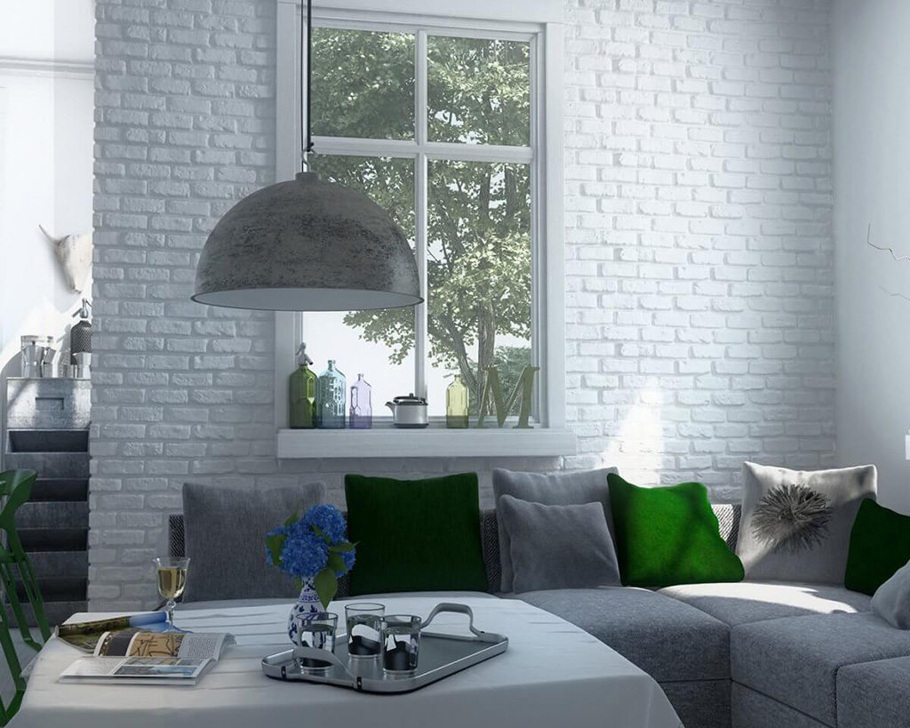 Salon z białą cegłą i szarym wypoczynkiem - inspiracja Parma Stegu