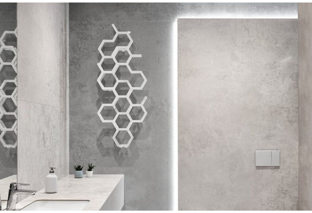grey bathroom with decorative heater