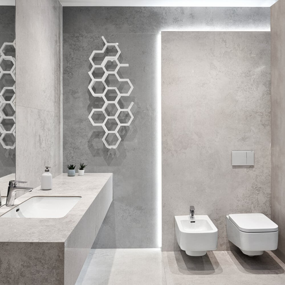 szara, minimalistyczna łazienka, biały grzejnik dekoracyjny w heksagony